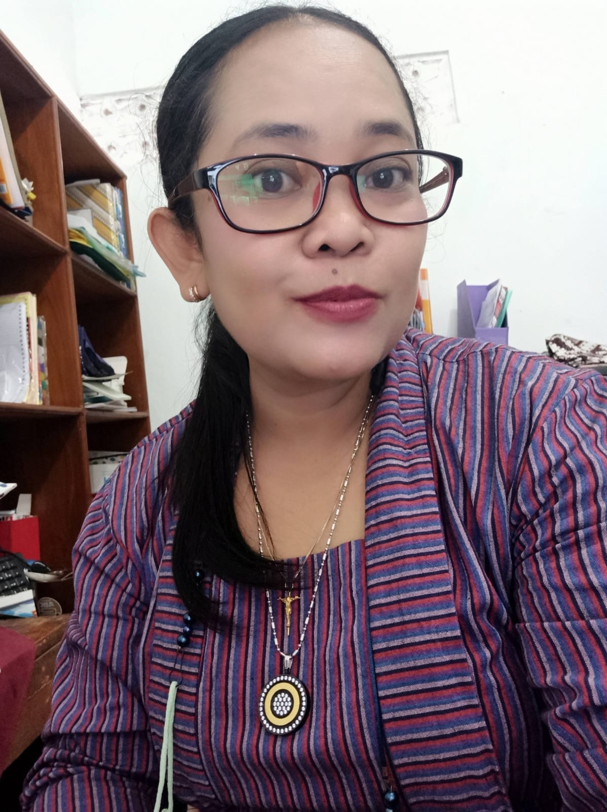 Maria Umbar Kristiana, S. T.